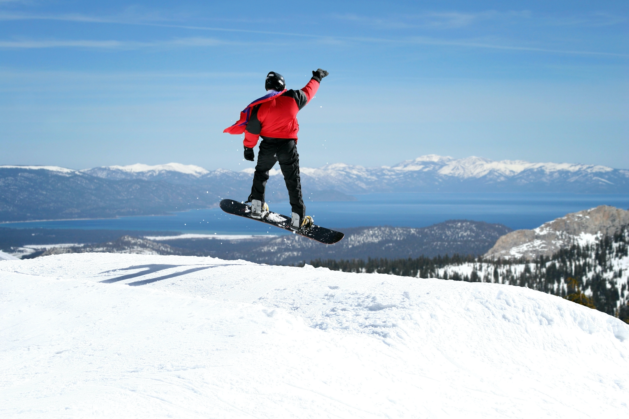 snowboarder mountain waving view vacation rental winter