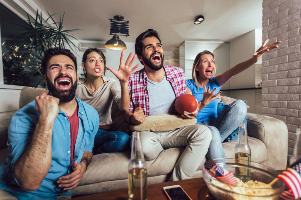 super bowl guests vacation rental party cheering